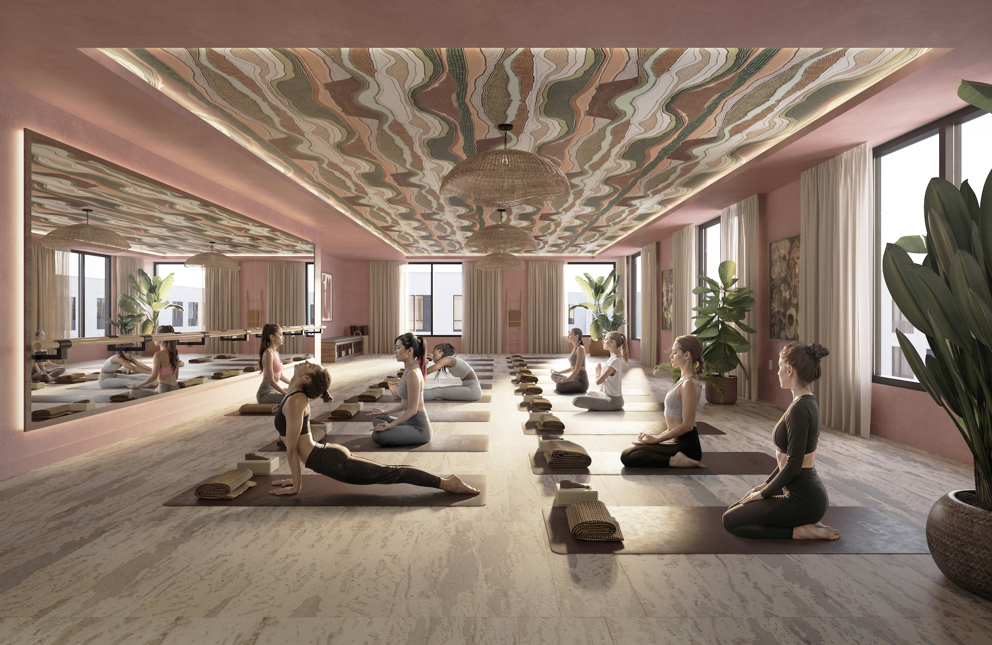 Texas A&M students doing yoga in The Jay's yoga studio
